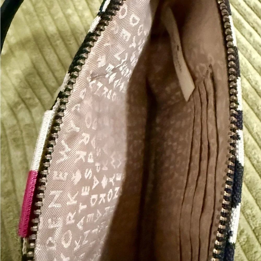 Kate Spade Black and White Linet Wristlet with Pink Accent